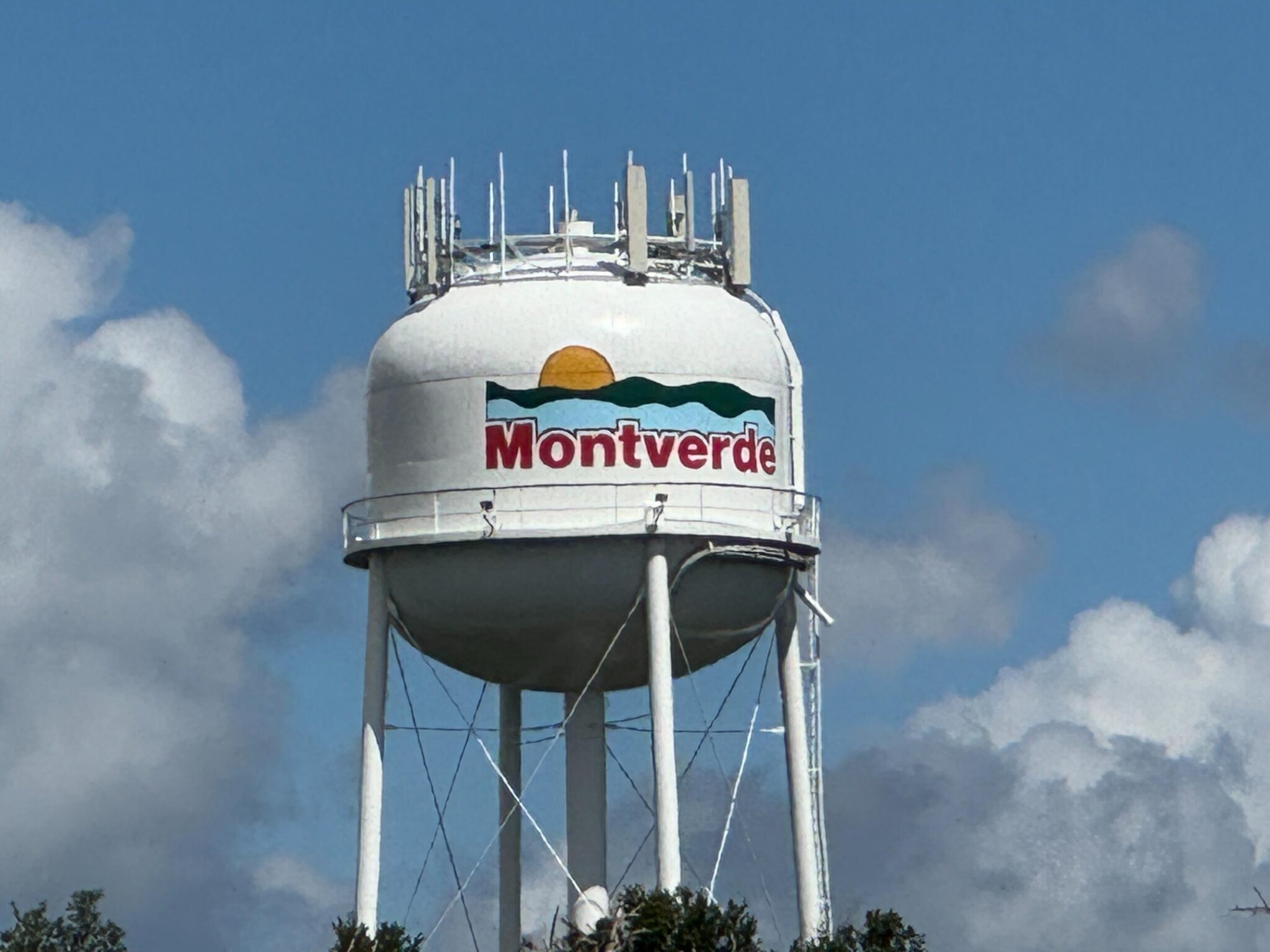 The Montverde water tower against a blue sky